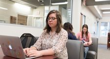 girl using laptop