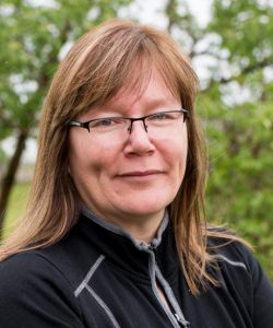 Photo of Dr. Elaine Innes outdoors.