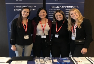 medical students pose together at conference