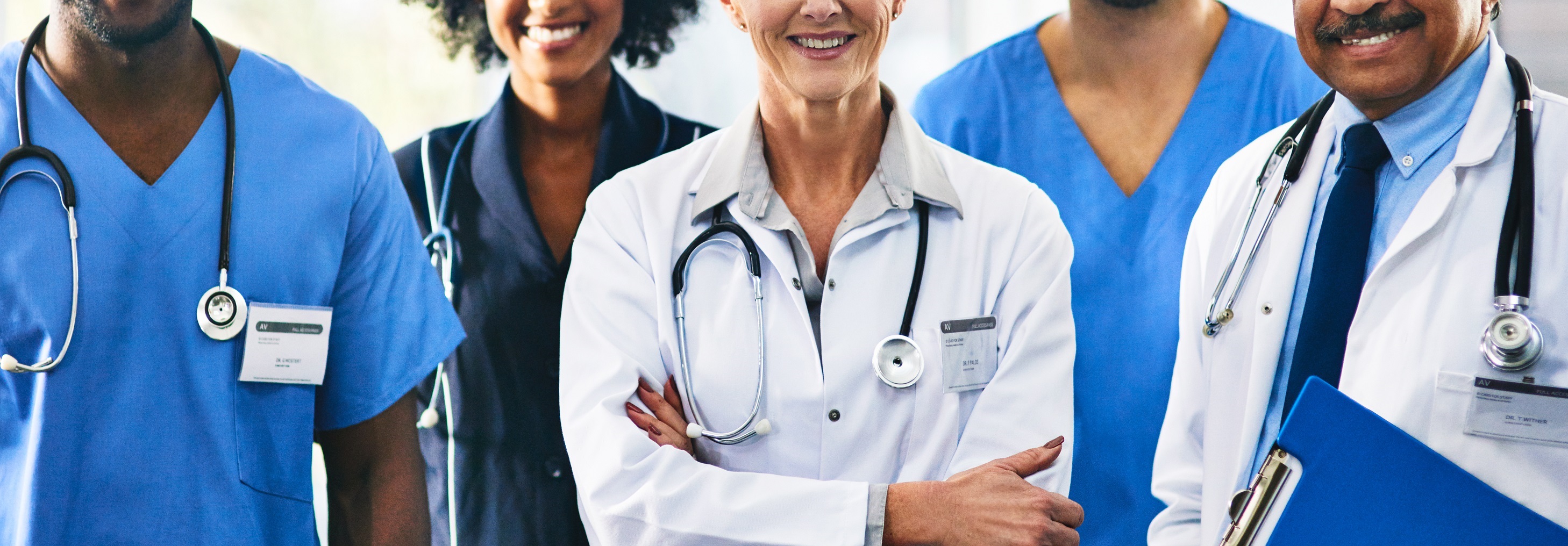 Portrait of a diverse team of doctors standing together in a hospital