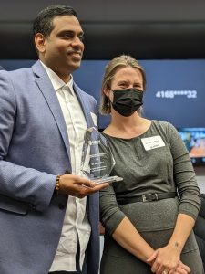 Dr. Khan accepts the NOSMU Medical Education award with Dr. Groot
